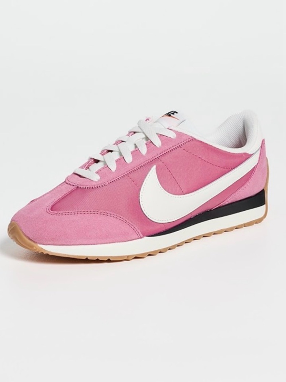Nike Women’s Pink Low-Profile Runner with White Swoosh and Gum Outsole
